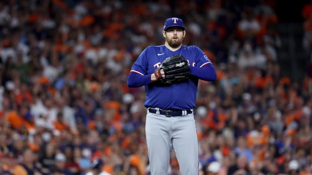 Oct 15, 2023; Houston, Texas, USA; Texas Rangers pitcher Jordan Montgomery (52) reacts after a walk during the third inning of game one of the ALCS against the Houston Astros in the 2023 MLB playoffs at Minute Maid Park. Mandatory Credit: Troy Taormina-USA TODAY Sports